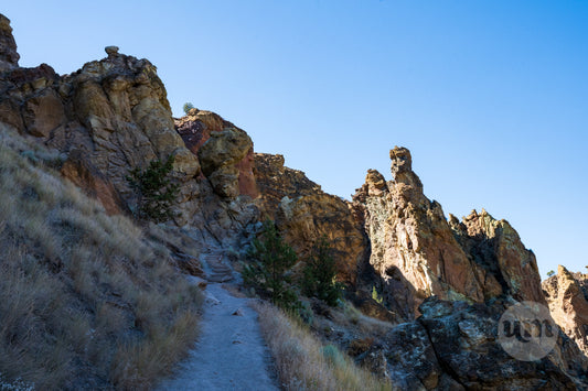 Scenic view of rocky cliffs and a clear blue sky