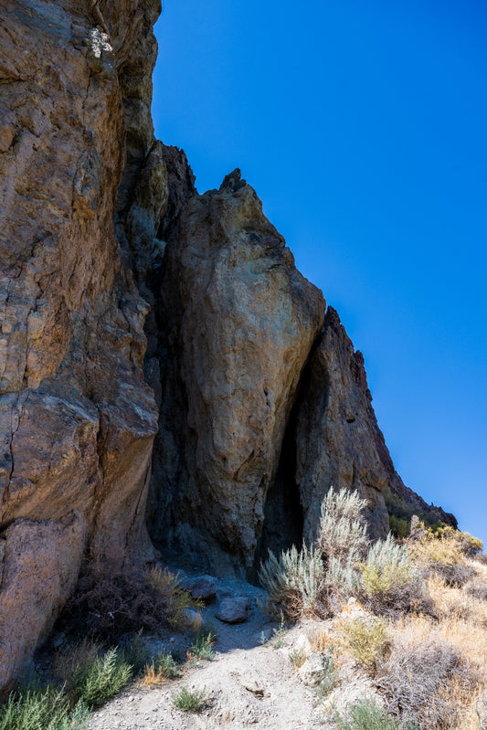 Rocks and desert landscape with clear blue sky